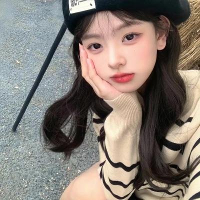 照片的她